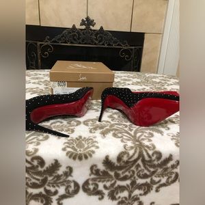 Brand new never worn black suede with silver spikes.